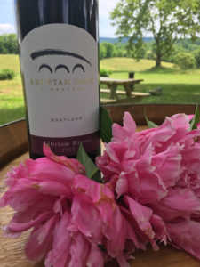 Antietam Creek Vineyards wine bottle and peonies